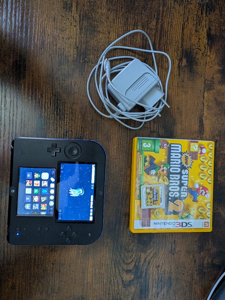 Gemodde Nintendo 2DS met New Super Mario Bros. 2, Zwart, 2DS, Ophalen of Verzenden, Gebruikt