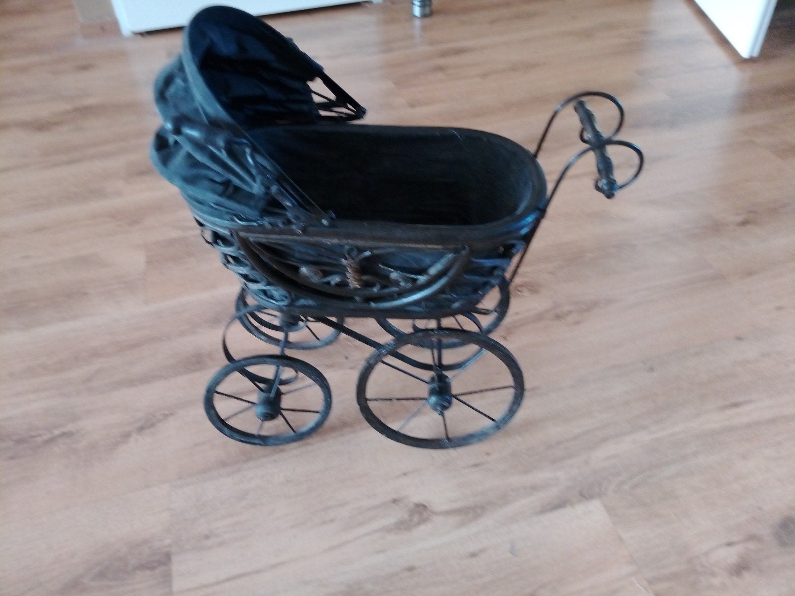 brocante kinderwagen, Ophalen