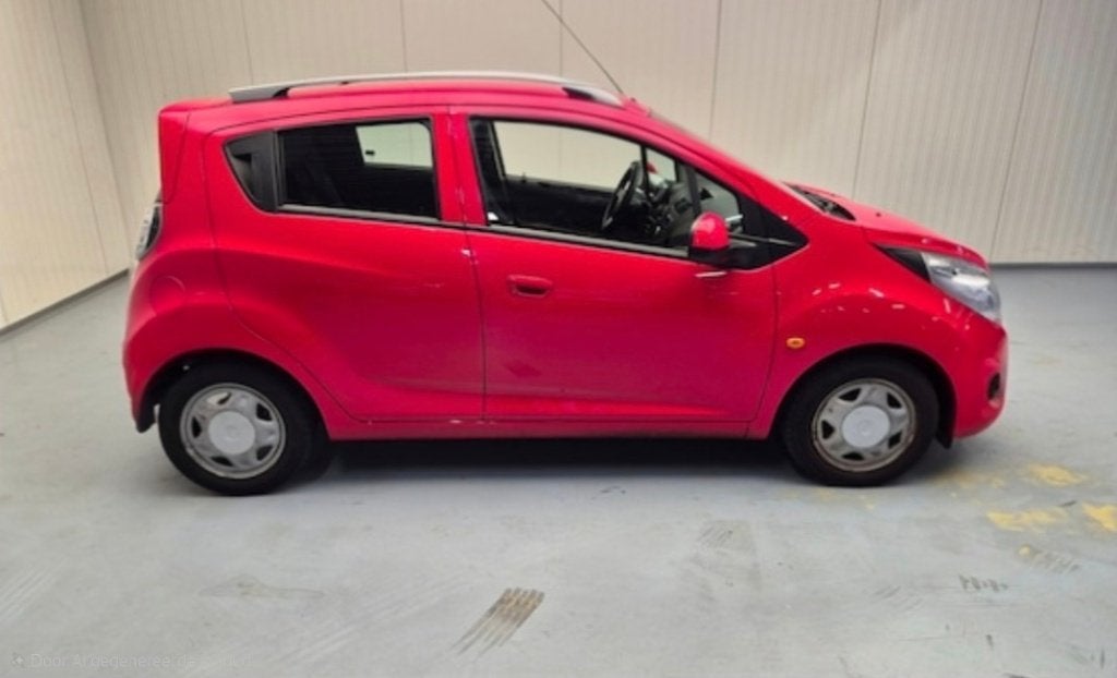Chevrolet Spark 1.0 Bifuel 2013 Rood, Auto's, Voorwielaandrijving, 15 km/l, 37 €/maand, Beige