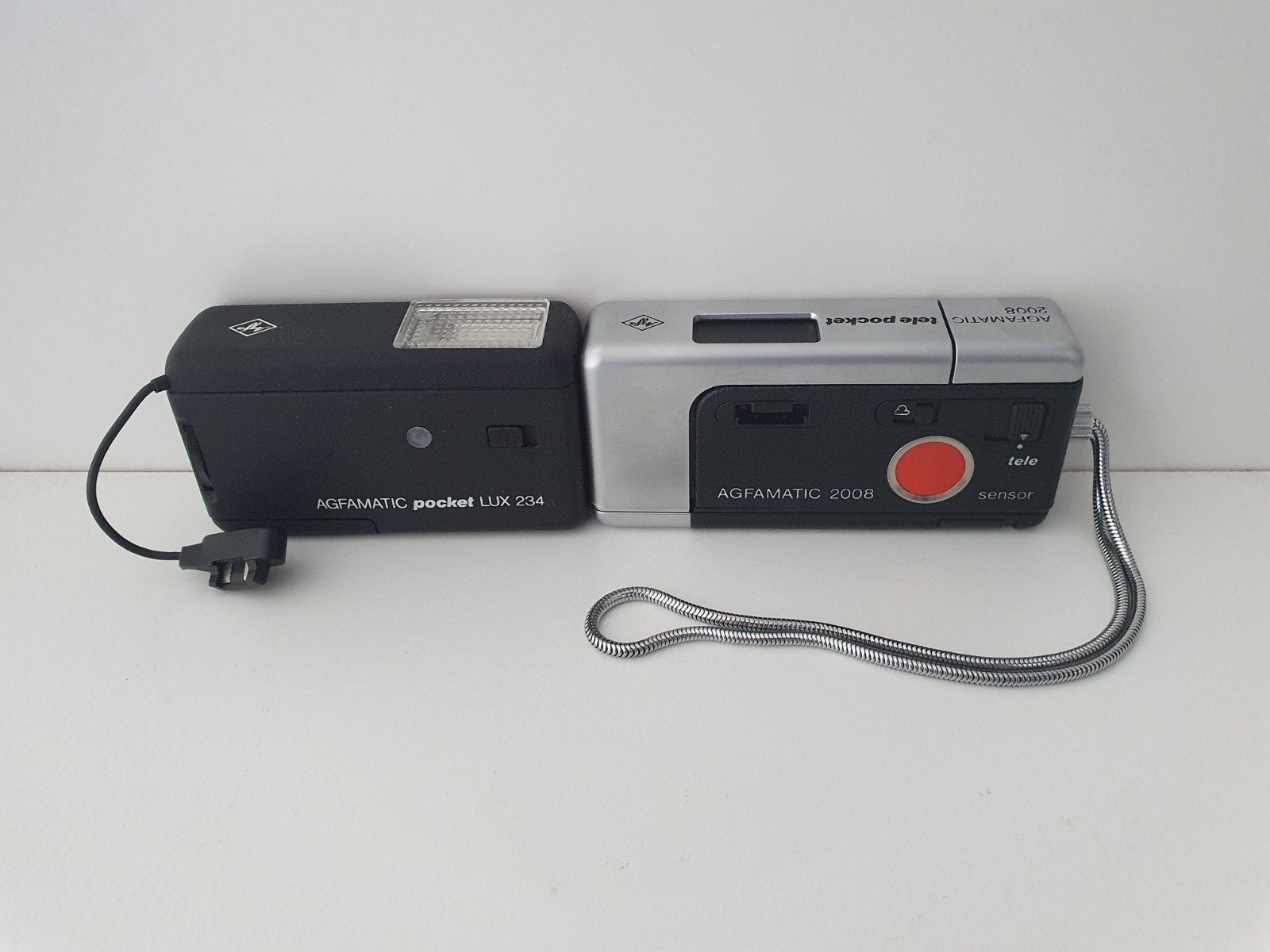 Agfa [DEFECT] pakket: Agfamatic 2008 en hoes, pocket lux 234, Ophalen of Verzenden, Niet werkend, Overige Merken