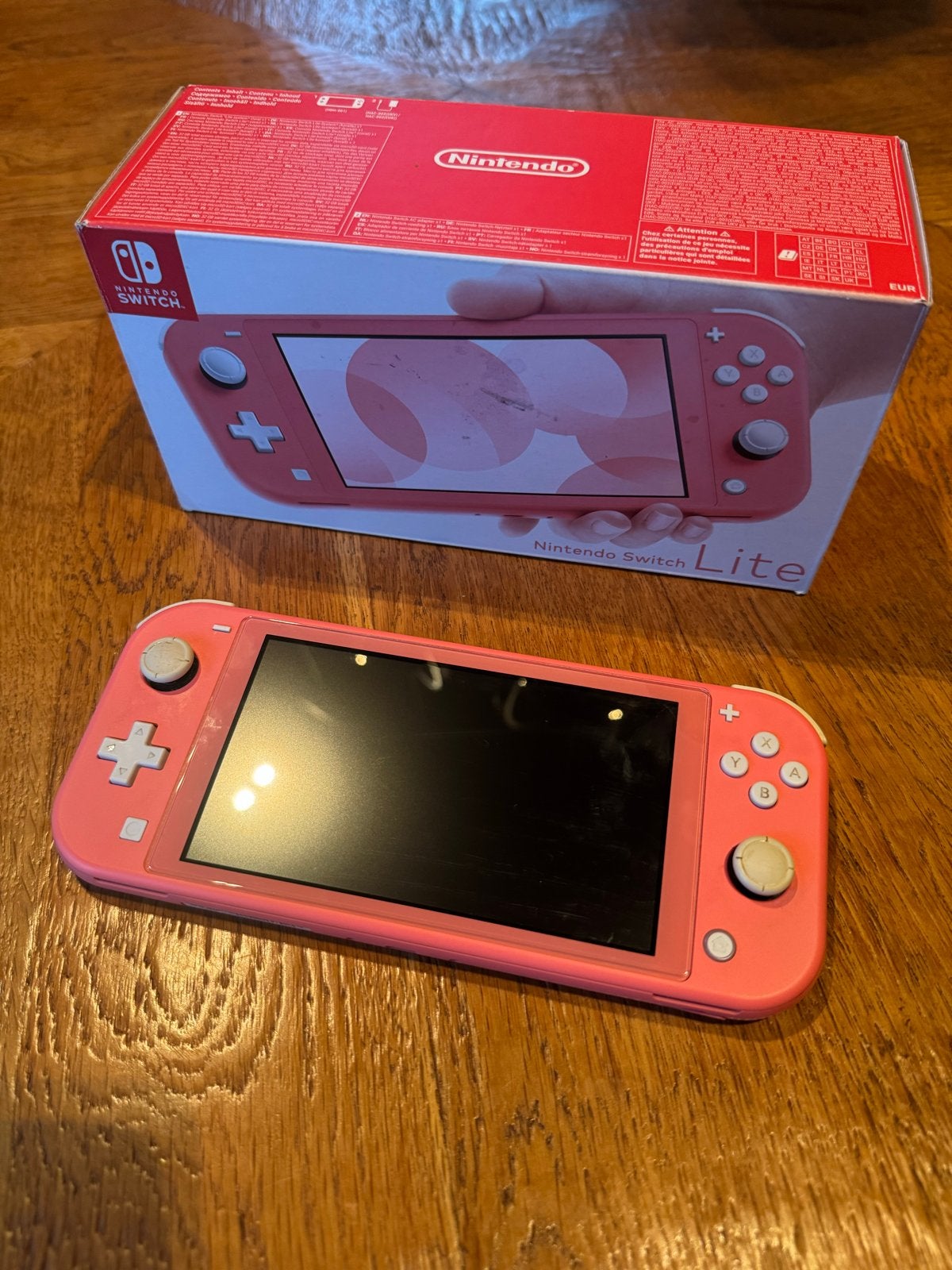 Nintendo Switch Lite Roze met doos, Spelcomputers en Games, Ophalen of Verzenden, Roze of Coral, Zo goed als nieuw