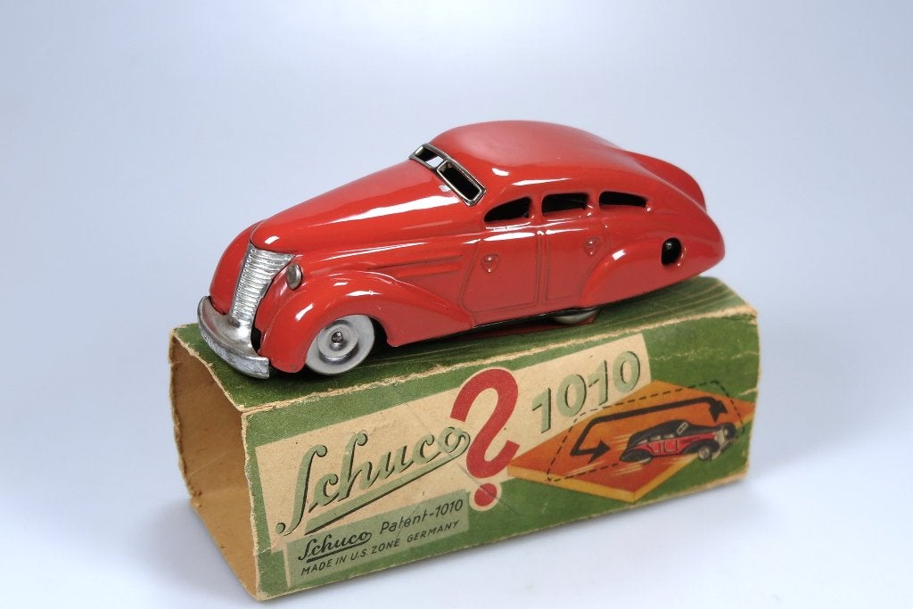 Schuco 1010 omkeerauto US-Zone (1946) Opwind werkt + Doosje, Ophalen of Verzenden