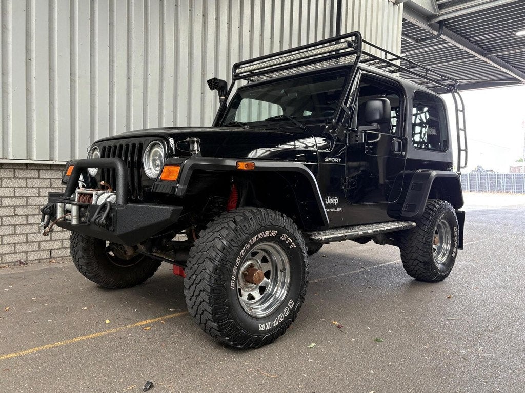 Jeep Wrangler 2.4 Sport — MOET WEG — Lees tekst., Auto's, Jeep, Stof, Gebruikt, Zwart, Handgeschakeld