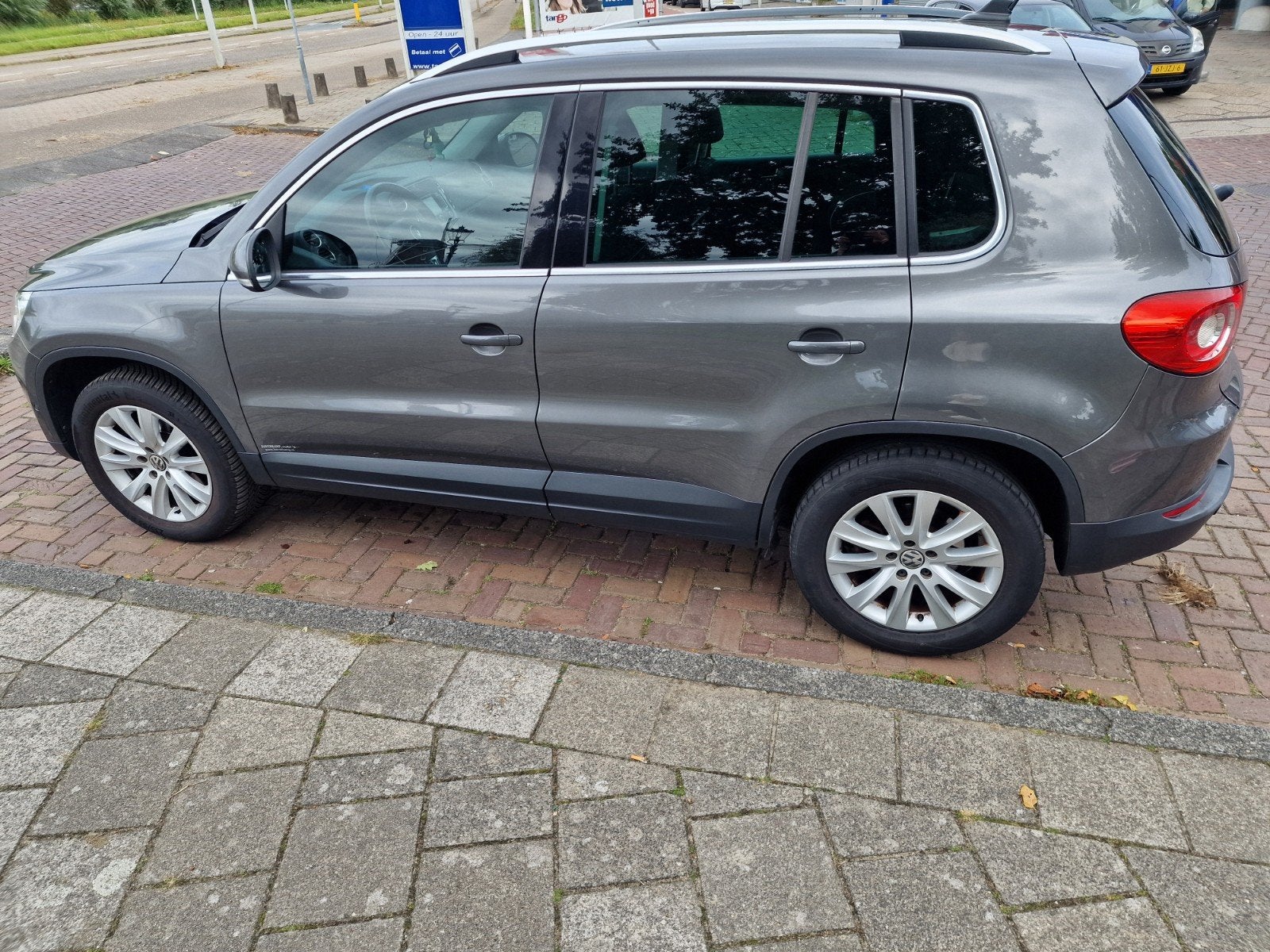 Volkswagen Tiguan 1.4 TSI 90KW BMT 2011 Grijs, Auto's, Voorwielaandrijving, 15 km/l, 4 cilinders, 122 pk