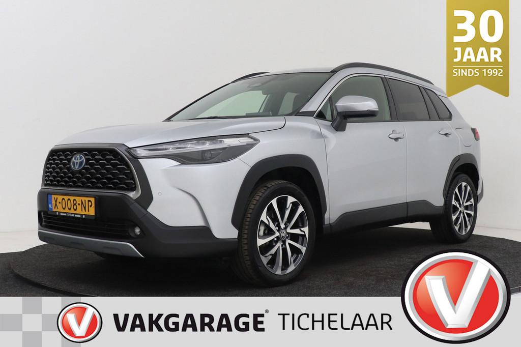 Toyota Corolla Cross Hybrid 140 Style | Trekhaak | Org NL |, Gebruikt, 4 cilinders, Leder en Stof, Origineel Nederlands