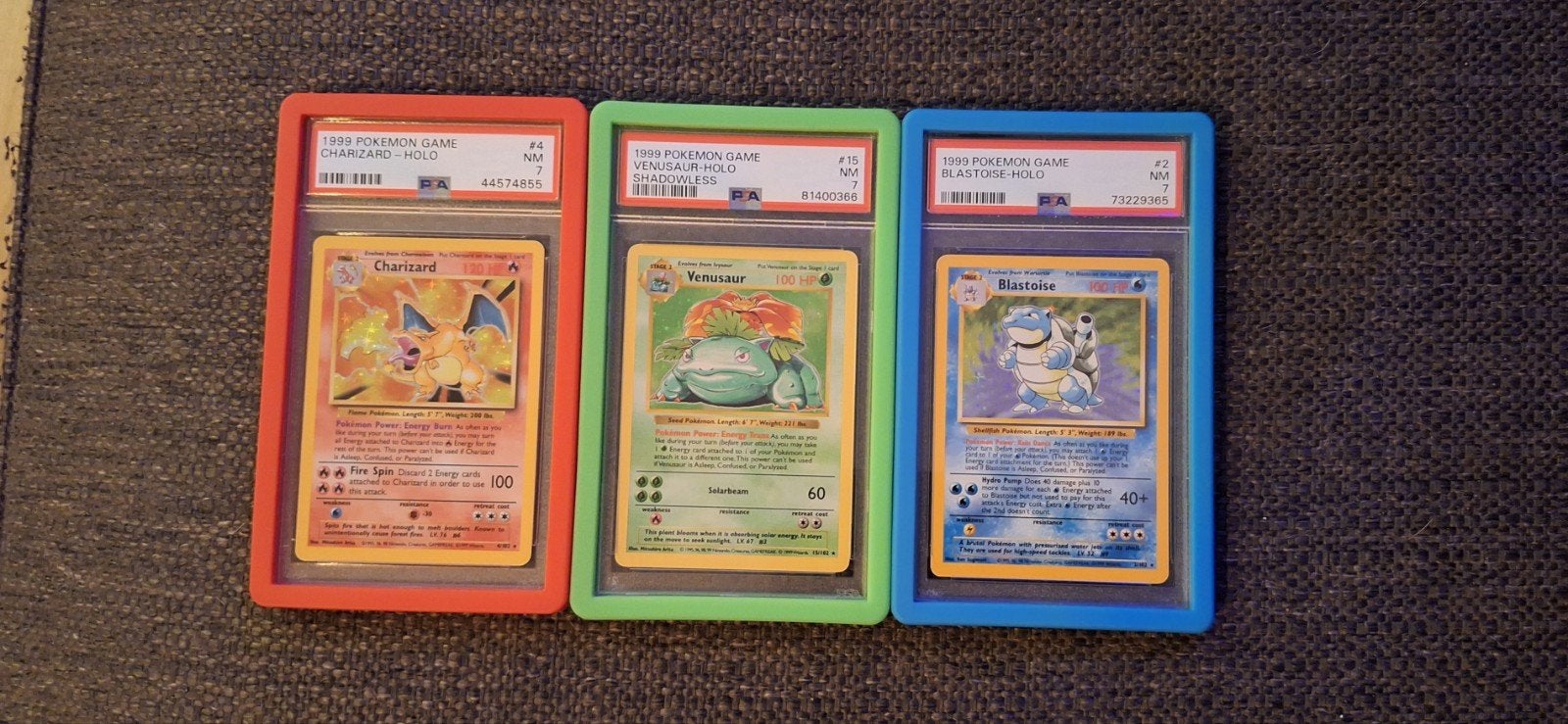 PSA 7 Graded Pokémon Kaarten: Charizard, Venusaur, Blastoise, Ophalen of Verzenden, Zo goed als nieuw, Meerdere kaarten, Foil
