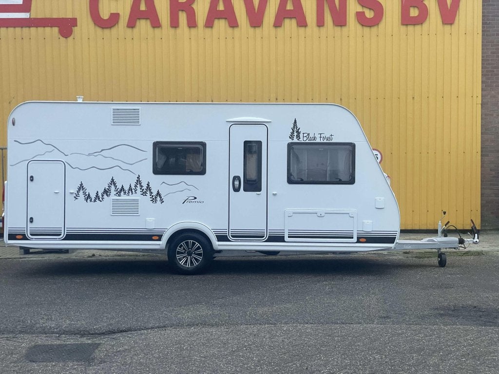 Bürstner Premio Black Forest 495 TK, Caravans en Kamperen, Caravans, Dwarsbed, Bedrijf, Bürstner, 5 tot 6 meter