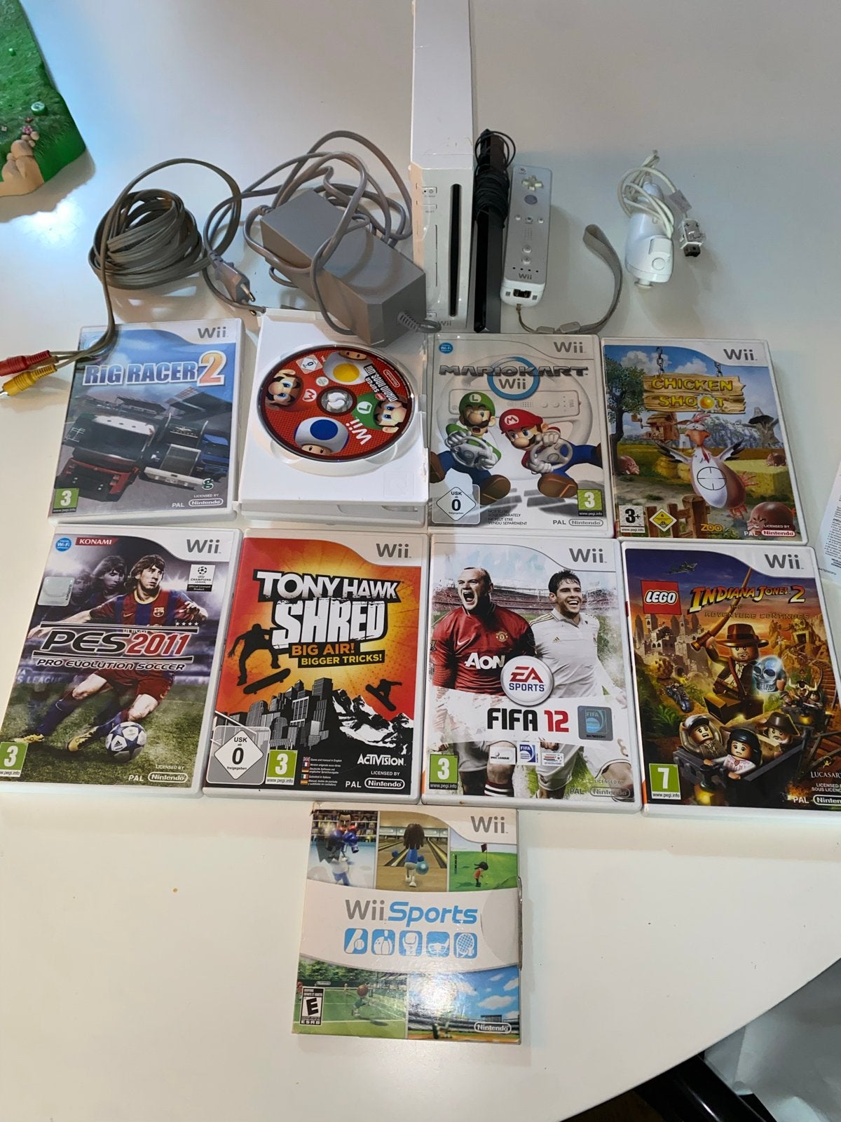 Wii Console met 9 games en accessoires, Spelcomputers en Games, Ophalen of Verzenden, Gebruikt, Met 1 controller, Met games