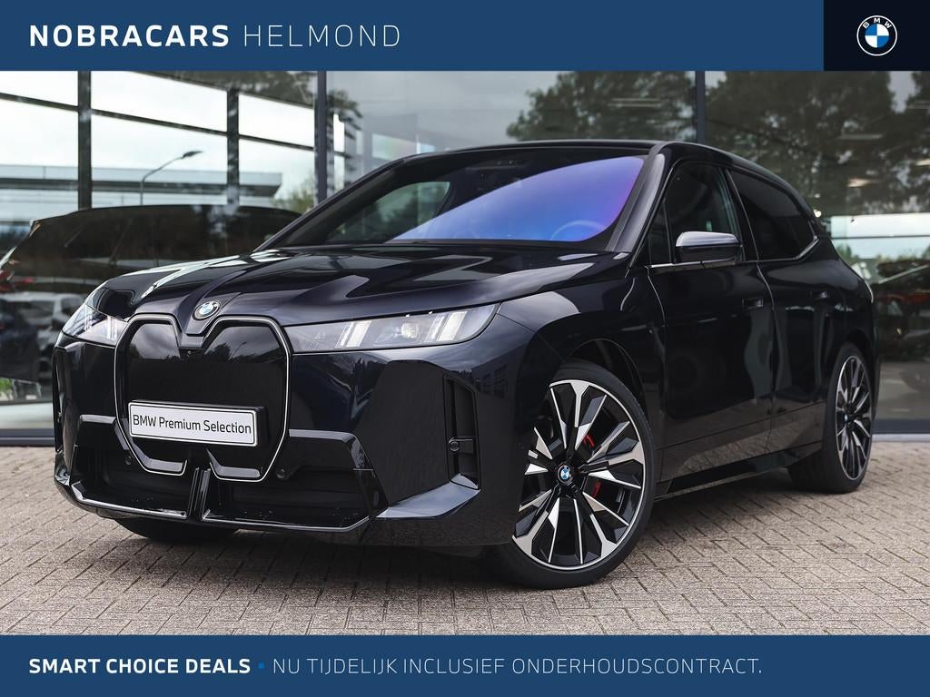 BMW iX xDrive45 M Sport / Panoramadak / Trekhaak / Stoelvent, Met garantie (alle), Zwart, Vierwielaandrijving, 408 pk