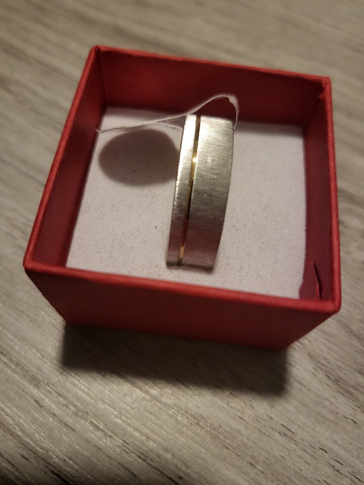Nieuwe ring, maat 21, zilverkleurig met gouden accent, 20 of groter, IJzer of Staal, Nieuw, Ophalen of Verzenden