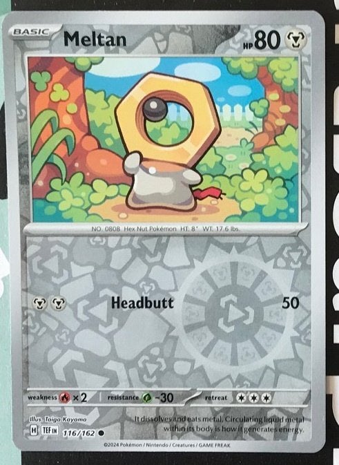 Pokemon - Meltan (TEF 116) - Reverse holo.., Ophalen of Verzenden, Nieuw, Losse kaart, Foil
