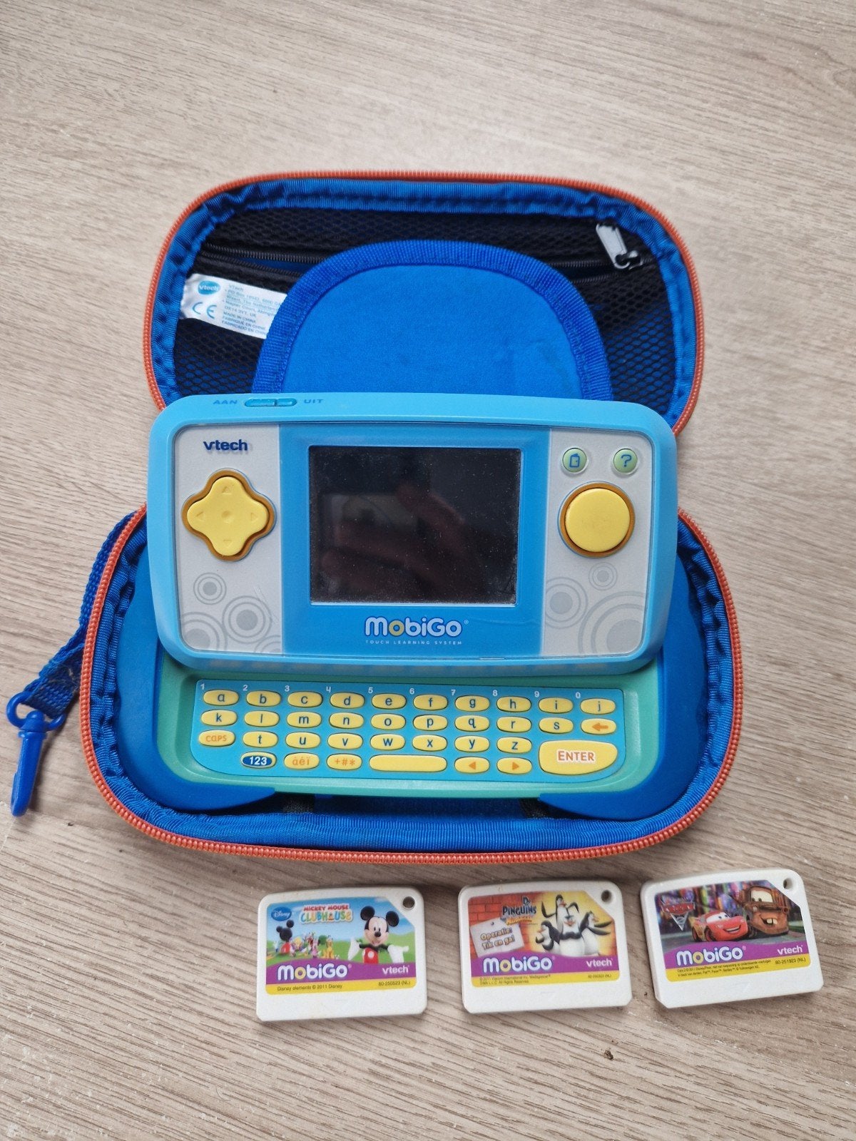 VTech MobiGo met 3 leuke spelletjes en hoes, Kinderen en Baby's, Speelgoed | Vtech, Ophalen of Verzenden