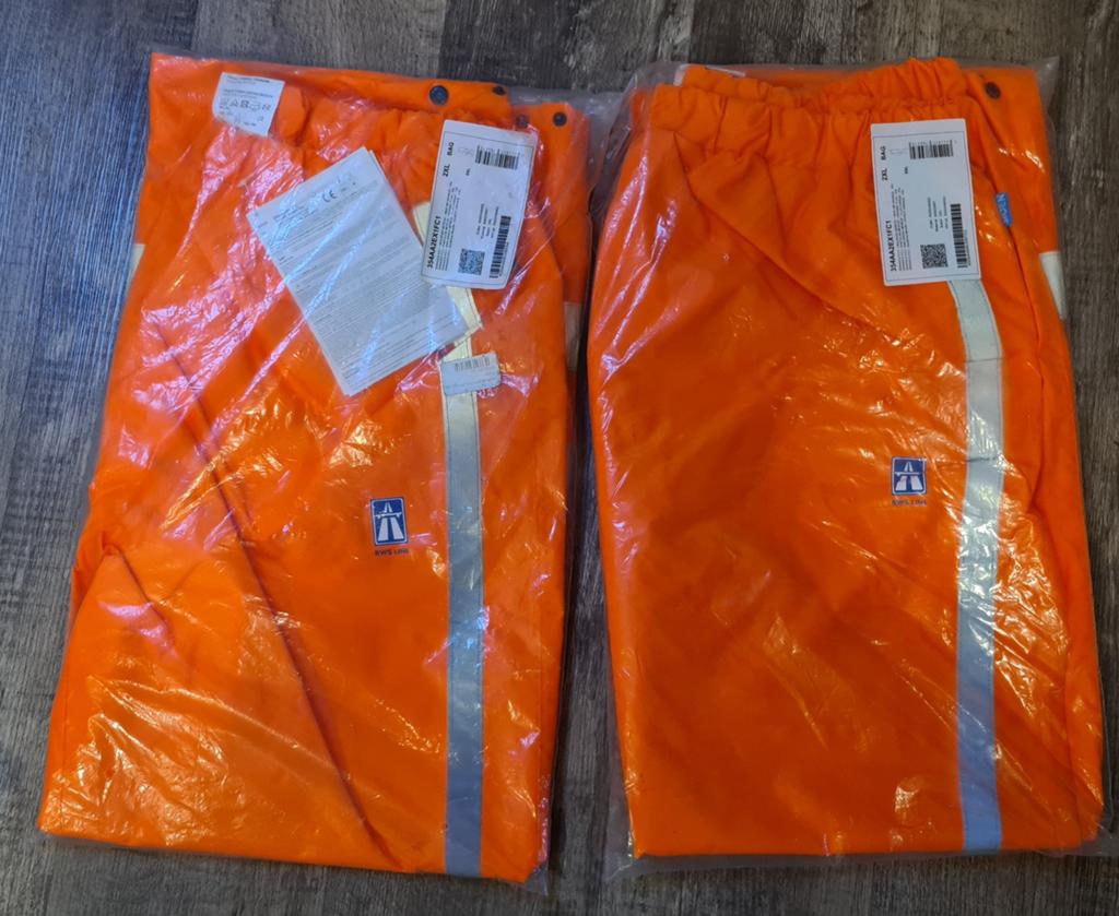 2x RWS regenbroek Oranje Reflecterend Maat XXL, Ophalen, Nieuw, Heren, Broek
