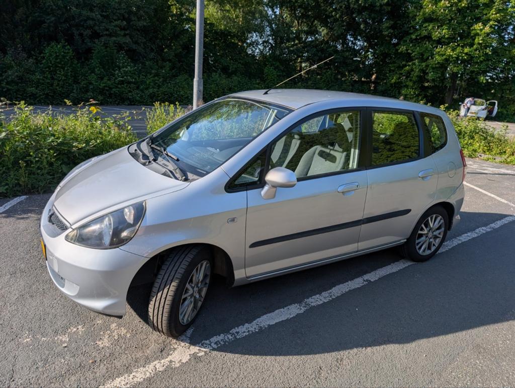 Honda Jazz 2005 Grijs met nieuwe APK, Auto's, Voorwielaandrijving, 40 €/maand, Startonderbreker, Handgeschakeld