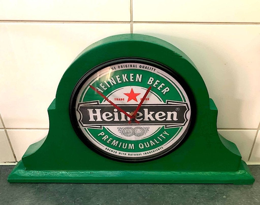 Te koop mancave leuke Heineken tafel cafe klok ., Ophalen of Verzenden, Zo goed als nieuw, Overige typen, Heineken