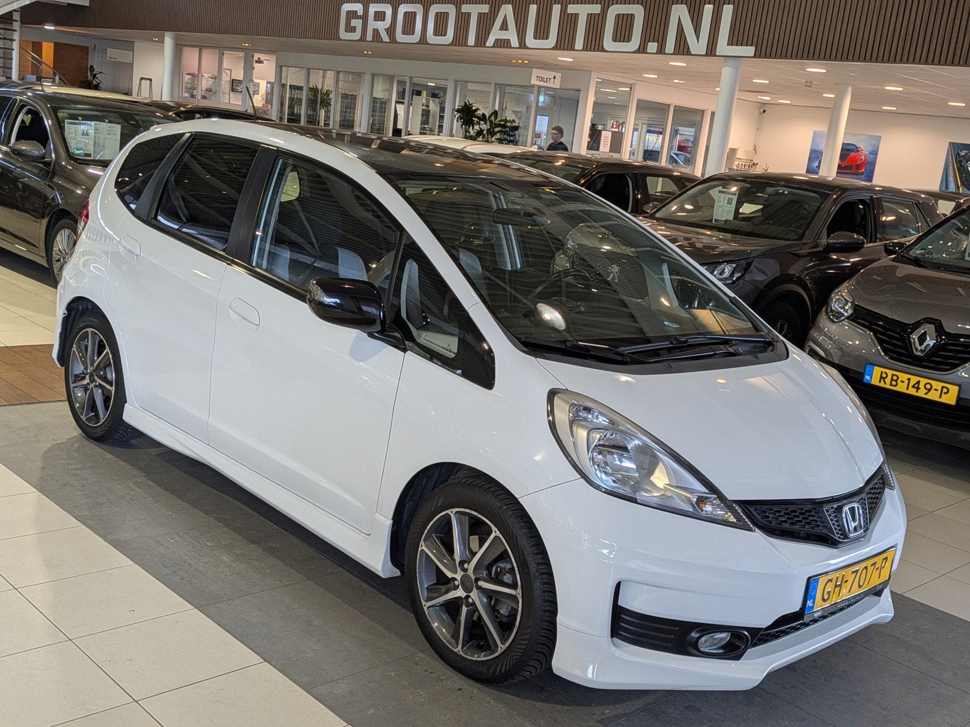 Honda Jazz 1.4 Elegance Airco, Cruise Control, Stuurbekracht, Auto's, Voorwielaandrijving, Euro 5, 4 cilinders, Wit