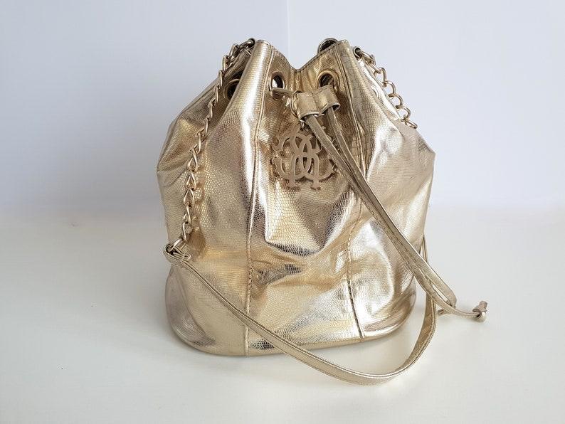 ROBERTO CAVALLI Bucket Bag metallic goud dames schoudertas, Ophalen of Verzenden, Gebruikt, Goud, Overige merken