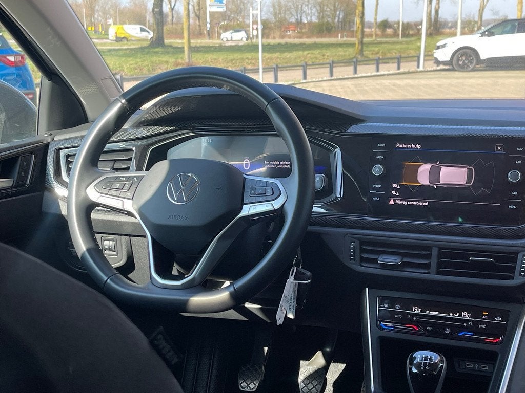 Volkswagen Taigo 1.0 TSi 95pk / Cruise control Adaptief / Ca, Auto's, Voorwielaandrijving, Stof, Gebruikt, Zwart