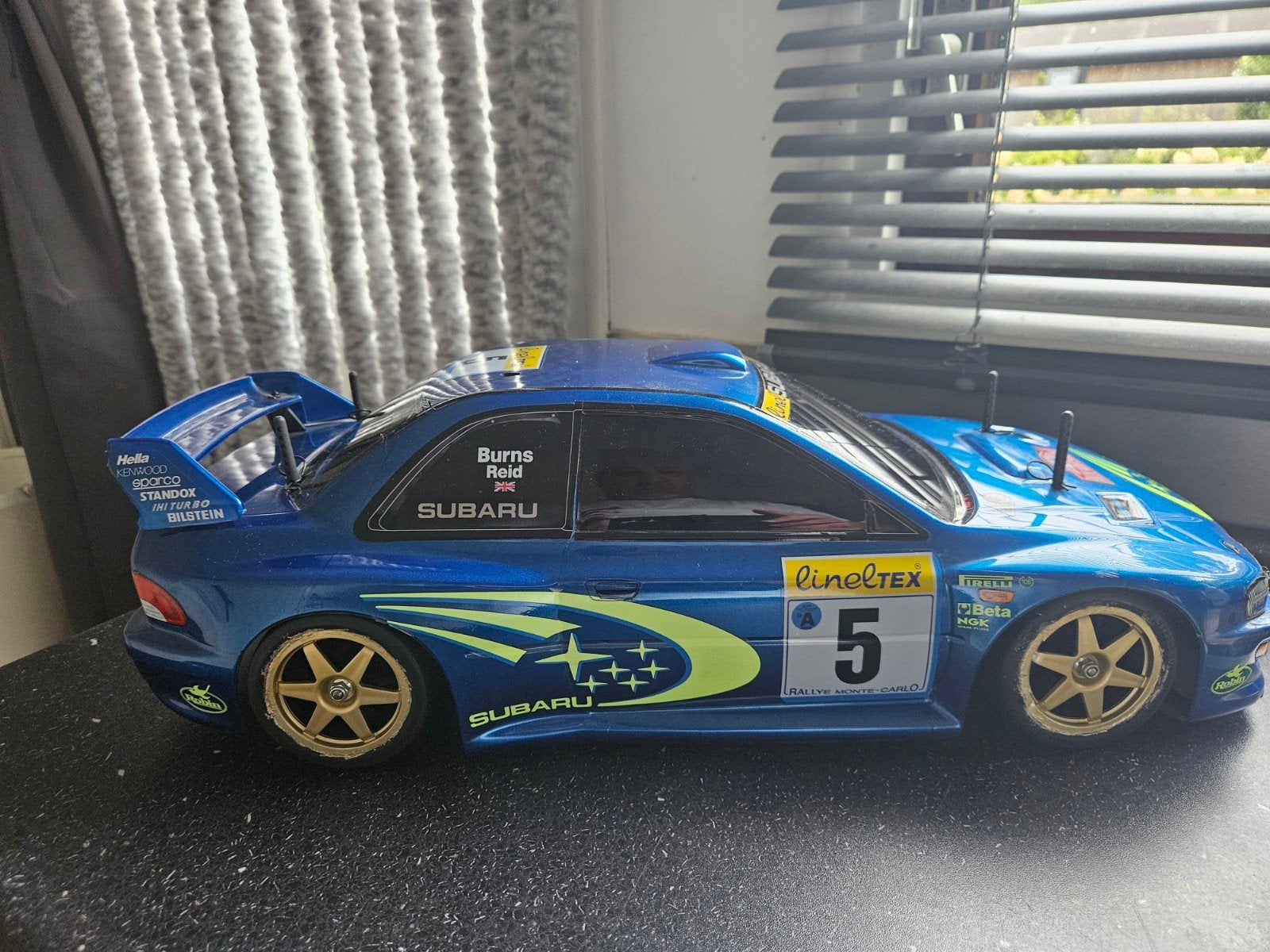 Tamiya tgx mk1 Subaru Impreza, Ophalen of Verzenden, Zo goed als nieuw, Auto onroad