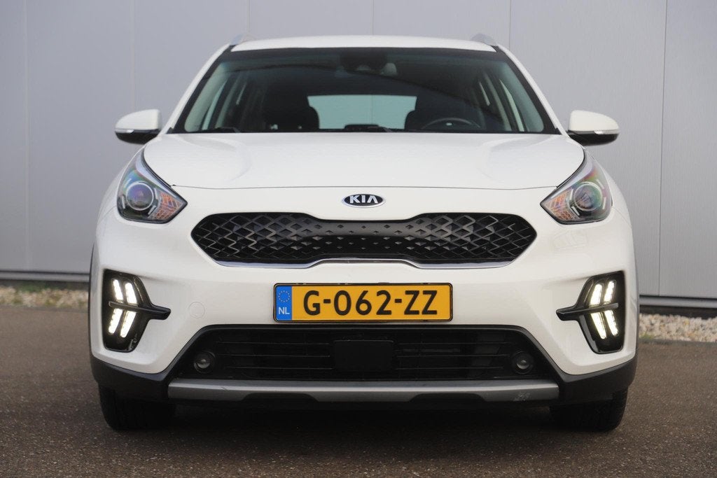 Kia Niro 1.6 GDi Hybrid DynamicLine Half Leder Navigatie Ach, Auto's, Kia, Gebruikt, Euro 6, Leder en Stof, Wit