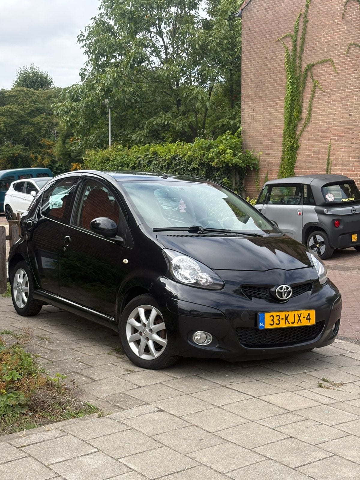 Toyota Aygo Platinum | Leer | Cruise | Airco | CarPlay, Auto's, Toyota, Voorwielaandrijving, 4 stoelen, Handgeschakeld, Particulier