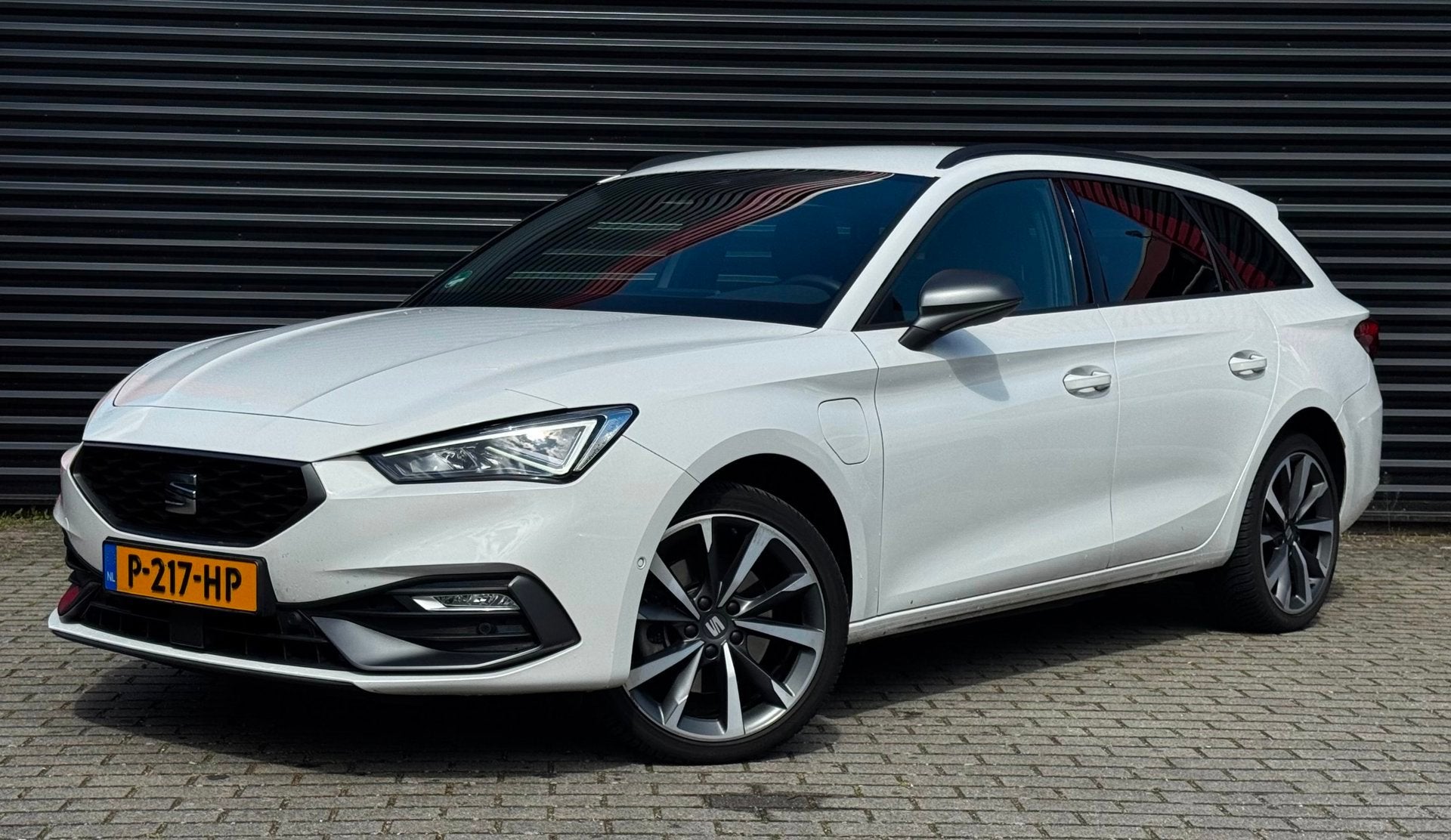 Seat Leon Sportstourer 1.4 TSI eHybrid PHEV FR Business Inte, Auto's, Gebruikt, 4 cilinders, 150 pk, Leon