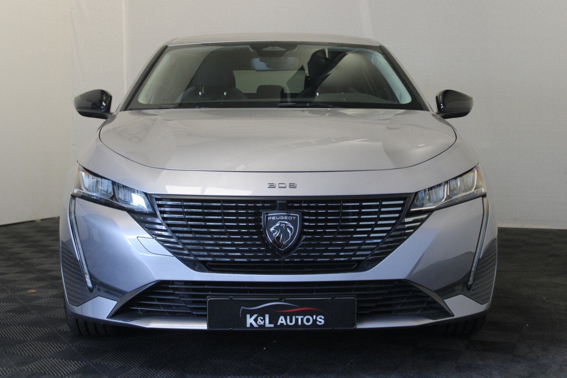 Peugeot 308 1.6 Plug-in Hybrid 180 Allure (bj 2023), Auto's, Parkeersensor, Gebruikt, 4 cilinders, Leder en Stof