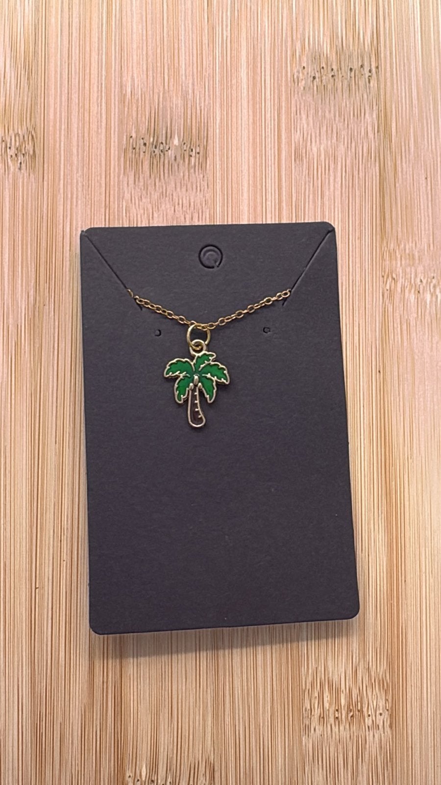 Goudkleurige ketting met palmboom hanger - Nieuw, Verzenden, Nieuw, Goud, Overige materialen