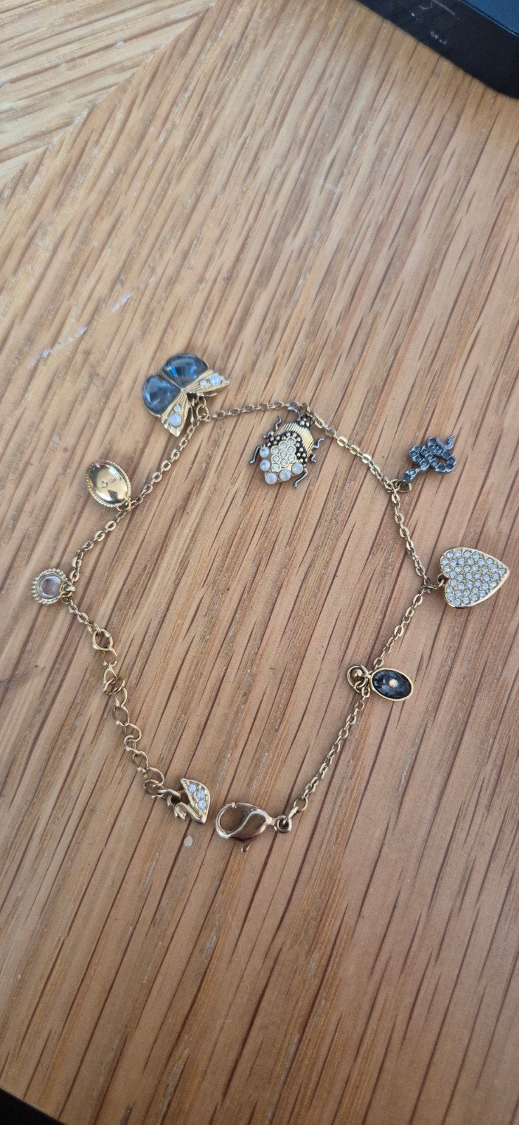 Swarovski Armband met bedels en kristallen, Overige materialen, Met bedels of kralen, Ophalen of Verzenden, Zo goed als nieuw