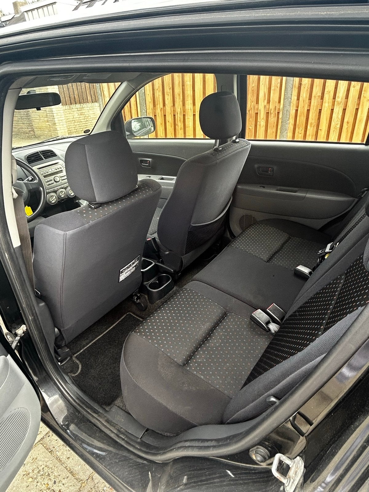 Daihatsu 2010 Zwart, Auto's, Zwart, Verwarming stoelen achter, Geïmporteerd, 998 cc