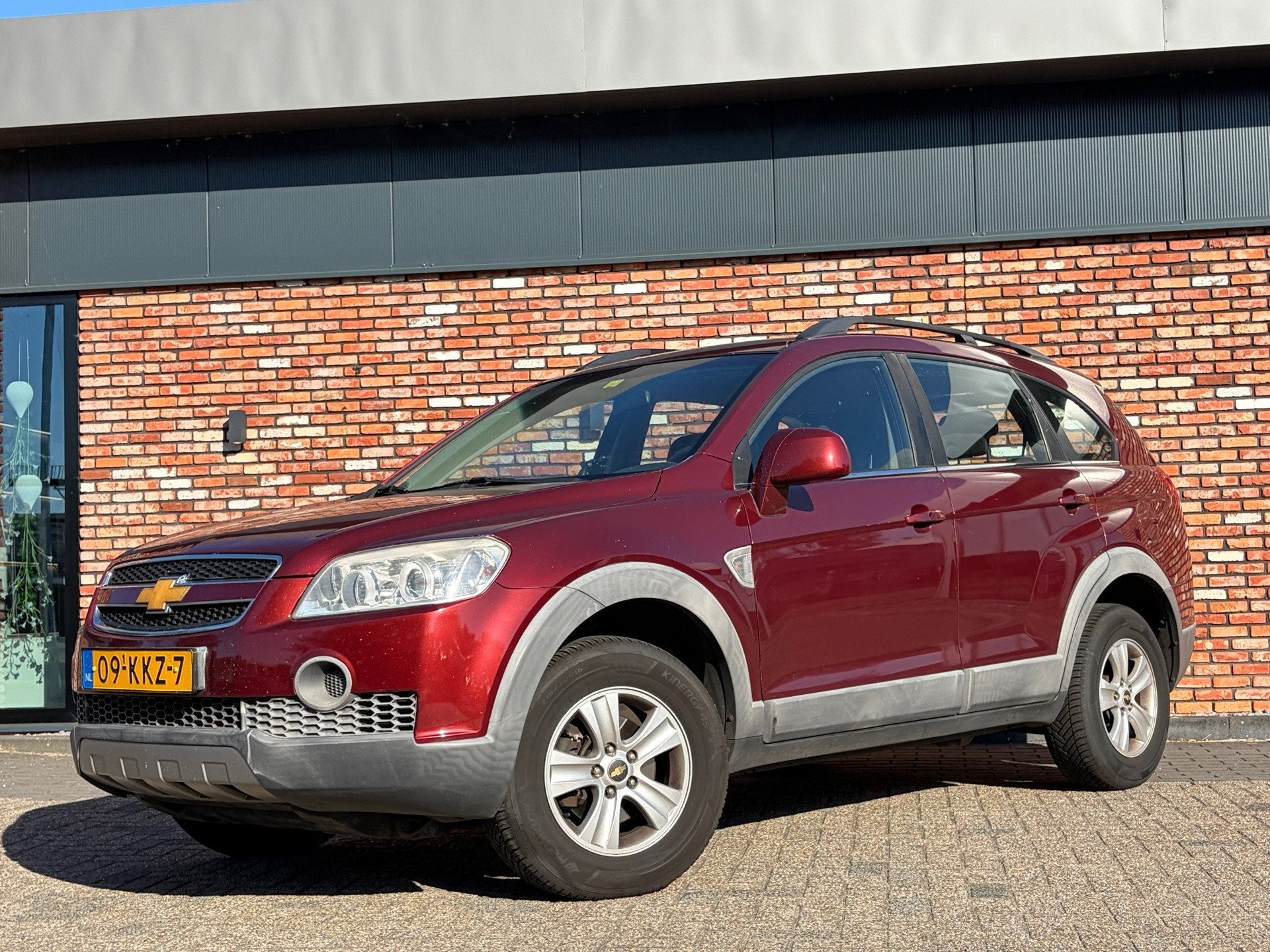 Chevrolet Captiva 2.4i Style 2WD 7-Pers Trekhaak Cruise Airc, Auto's, Euro 5, Gebruikt, Zwart, 4 cilinders