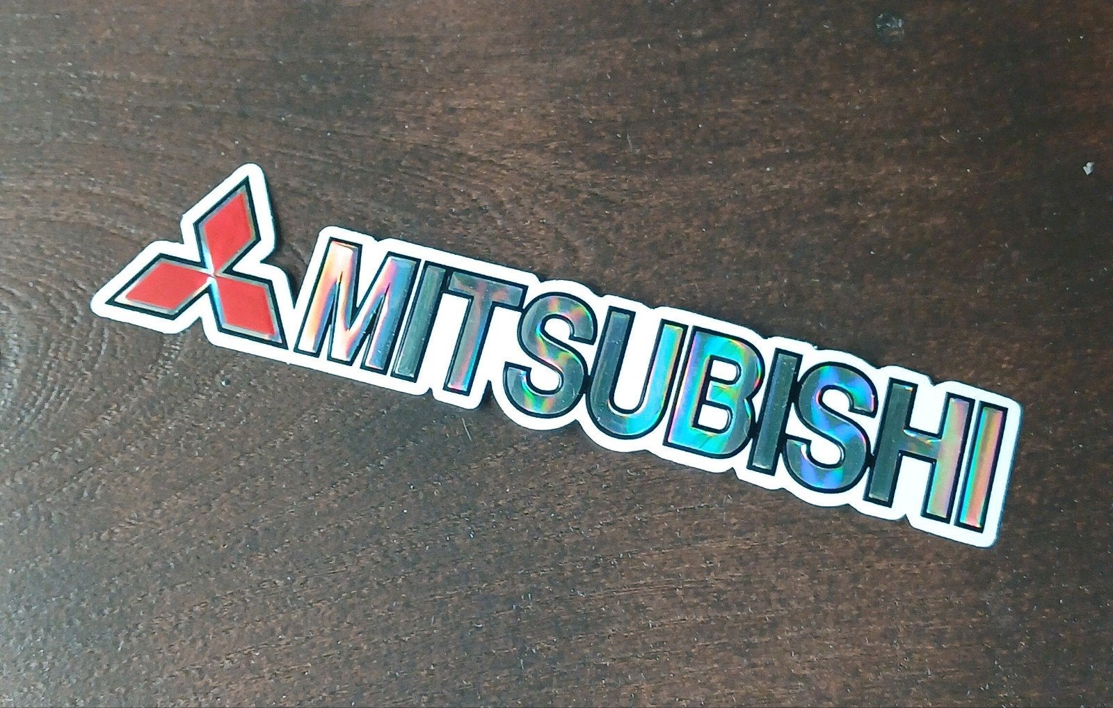 Sticker auto Mitsubishi reliëf embossed glimmend 1,10 p stuk, Ophalen of Verzenden, Zo goed als nieuw, Auto of Motor