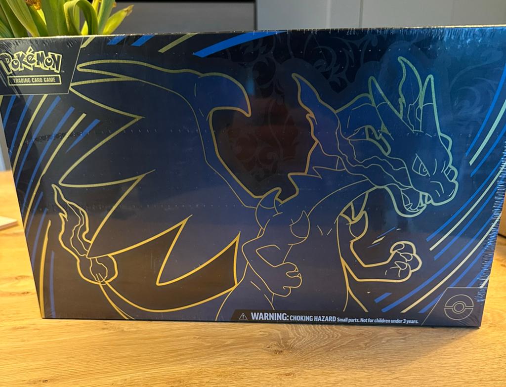 Mega charizard Ex UPC, Ophalen of Verzenden, Zo goed als nieuw