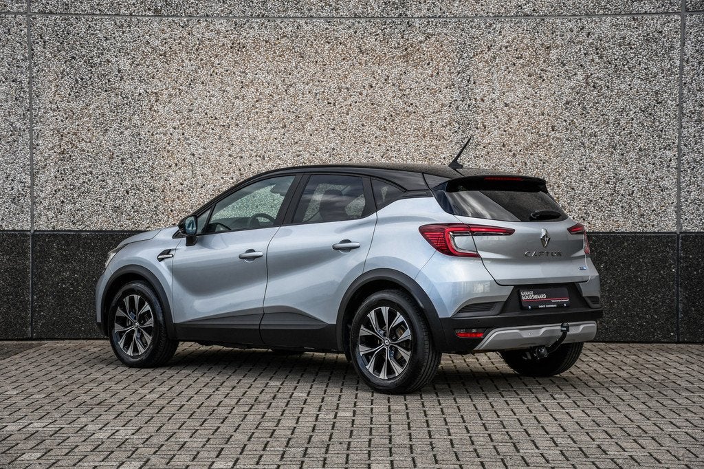 Renault Captur 1.6 E-Tech Hybrid 145 Rive Gauche (bj 2022), Auto's, Stof, Gebruikt, 715 kg, Bedrijf