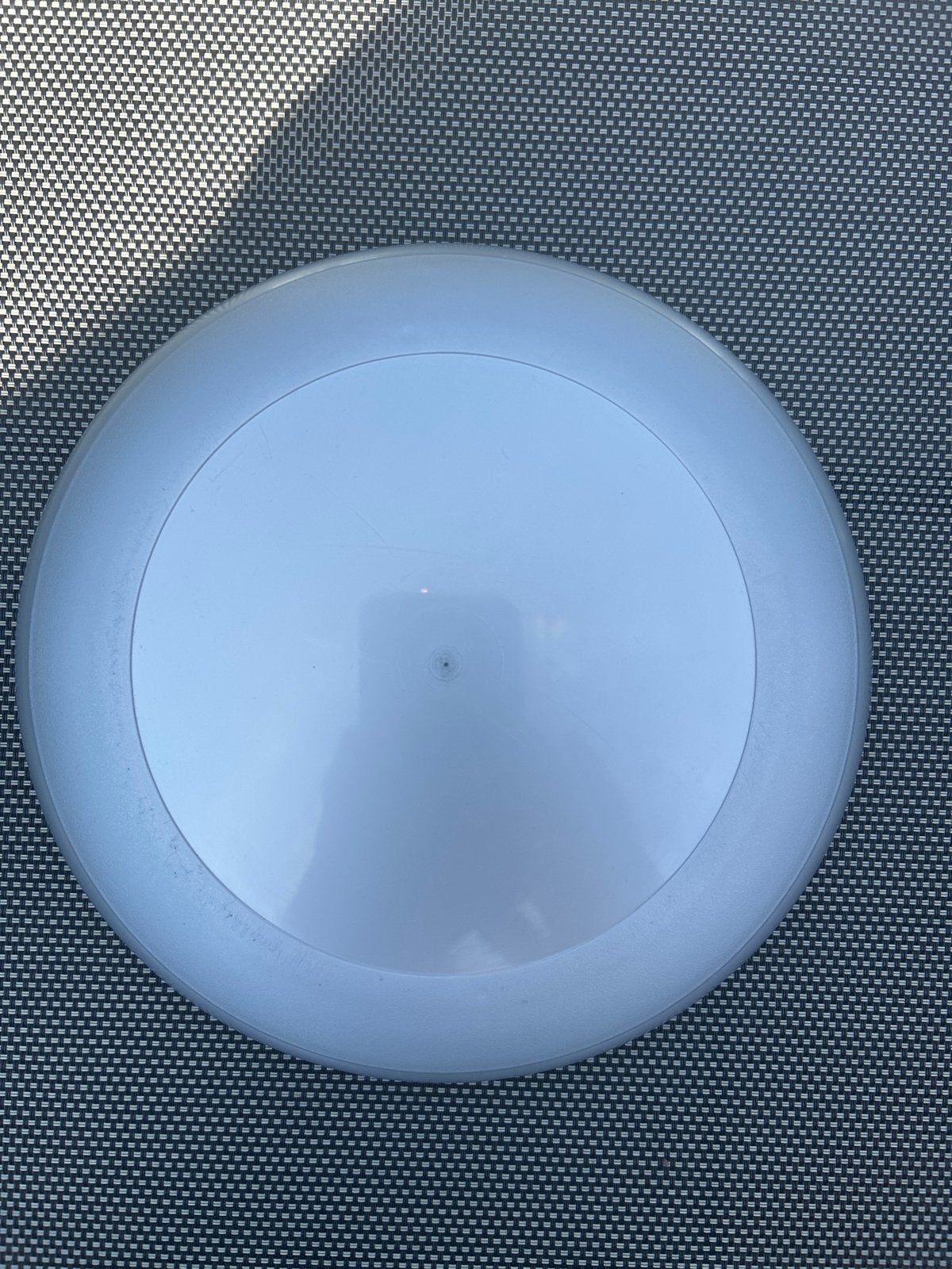 Grijze frisbee van kunststof, Ophalen of Verzenden, Gebruikt