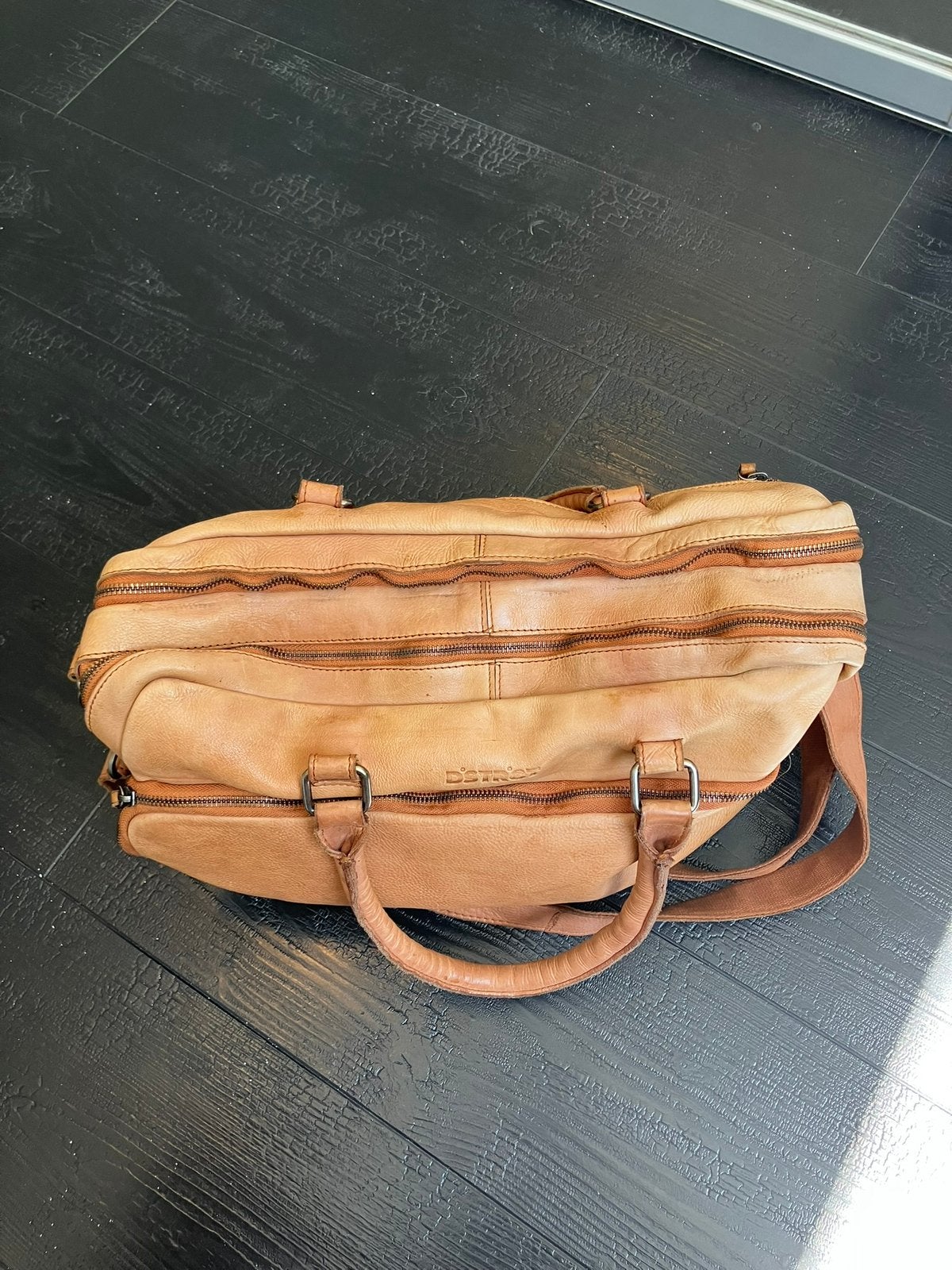 Dstrct leren tas te koop, Sieraden, Tassen en Uiterlijk, Ophalen of Verzenden, Zo goed als nieuw, Bruin