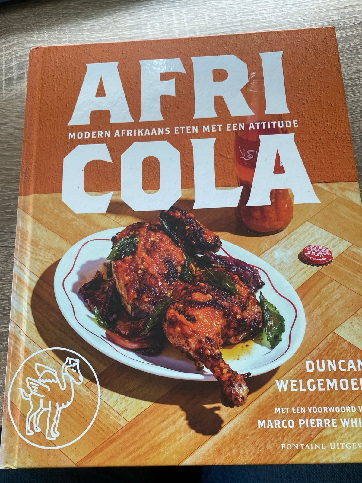 Africola: Modern Afrikaans Eten met een Attitude, Boeken, Ophalen of Verzenden, Zo goed als nieuw, Afrika, Hoofdgerechten
