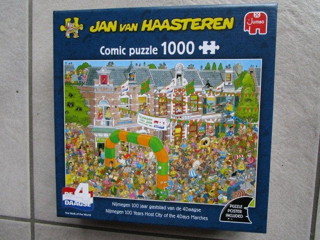 JAN VAN HAASTEREN NIJMEGEN 100 JAAR GASTSTAD VAN DE 4-DAAGSE, Ophalen of Verzenden, 500 t/m 1500 stukjes, Zo goed als nieuw, Legpuzzel