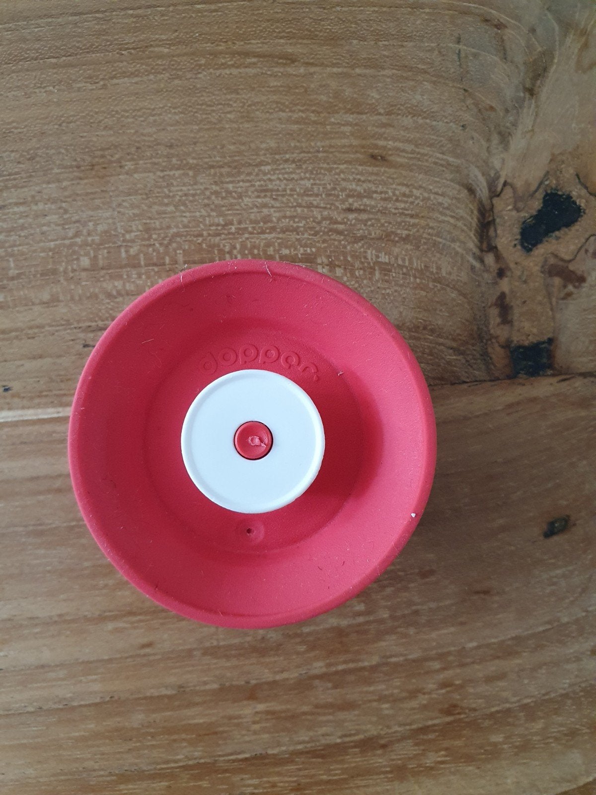 Dopper sport dop, Ophalen