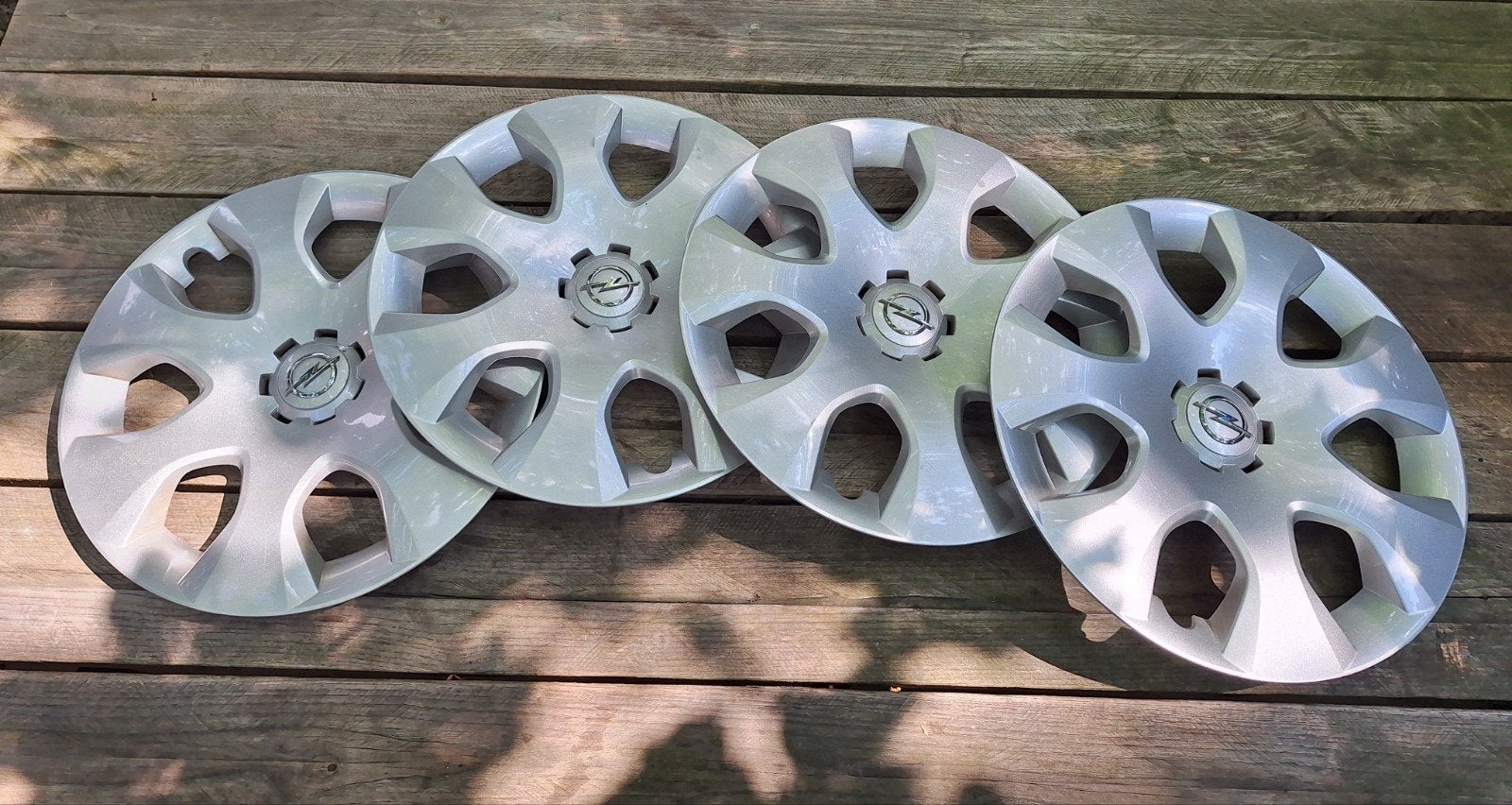 Set (4) wieldoppen. Origineel Opel/16 inch. Iprst., Ophalen of Verzenden, Zo goed als nieuw