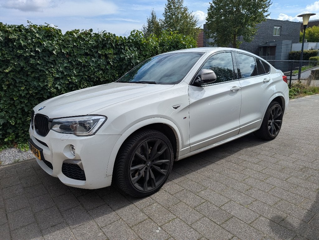 BMW X4 3.0 Xdrive M40i AUT 2016 Wit, Auto's, Zwart, 2000 kg, 360 pk, Wit