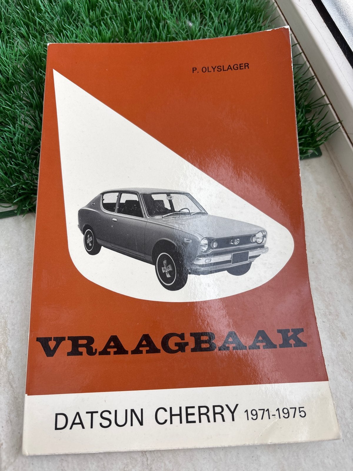 Vraagbaak Datsun Cherry 1971-1975 - P. Olyslager, Ophalen of Verzenden, Gelezen, Nissan