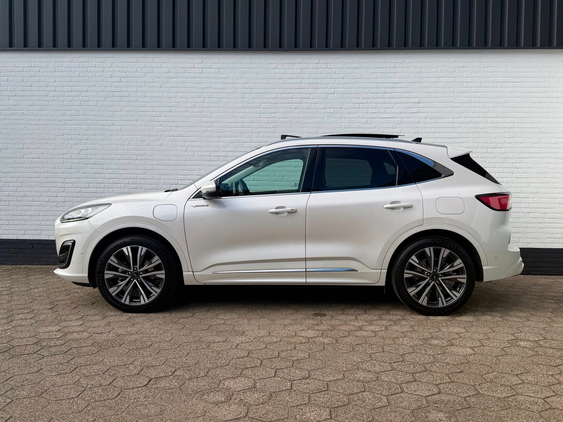 Ford Kuga 2.5 PHEV Vignale PANODAK l ACC l B&O l TREKHAAK l, Auto's, Gebruikt, Zwart, 4 cilinders, Adaptive Cruise Control