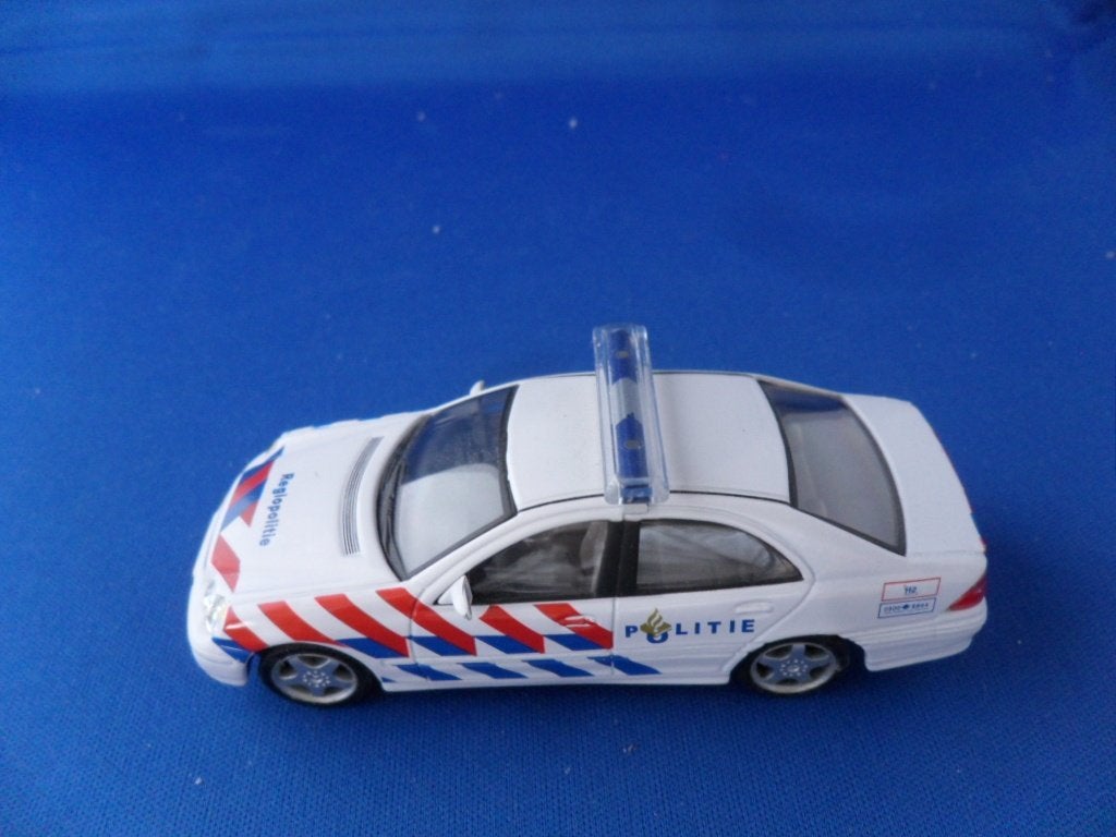 Mercedes-Benz  C Klasse Politie Auto Model 1:43 Cararama, Hobby en Vrije tijd, Modelauto's | 1:43, Ophalen of Verzenden, Zo goed als nieuw