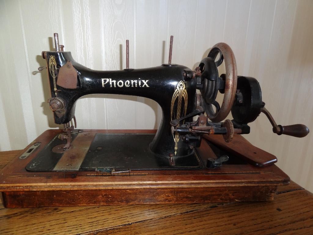 Phoenix naaimachine, Ophalen
