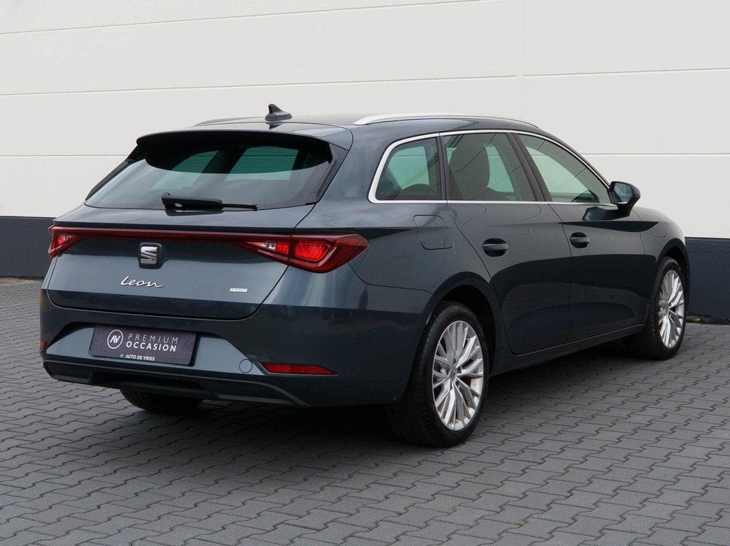 Seat Leon Sportstourer 1.4 TSI eHybrid 204pk PHEV Xcellencee, Auto's, Seat, Gebruikt, 4 cilinders, Leon, Leder en Stof