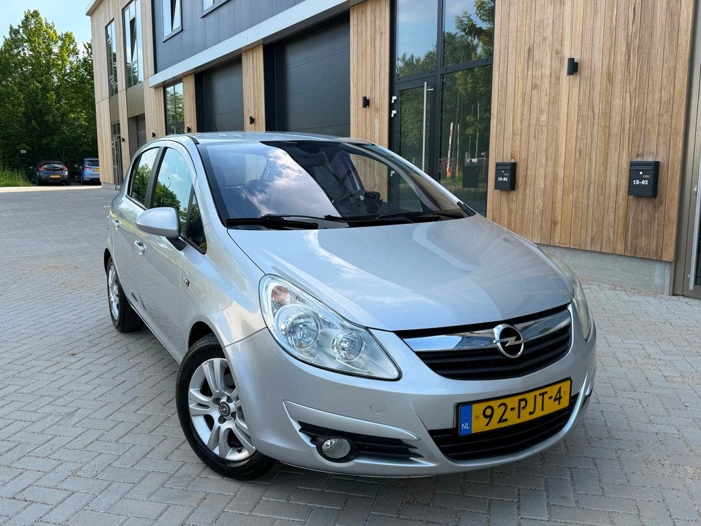 Opel Corsa 1.3 CDTi EcoFlex S/S Cosmo (bj 2011) 5-DEURS|CLIM, Voorwielaandrijving, 28 km/l, Gebruikt, Leder en Stof