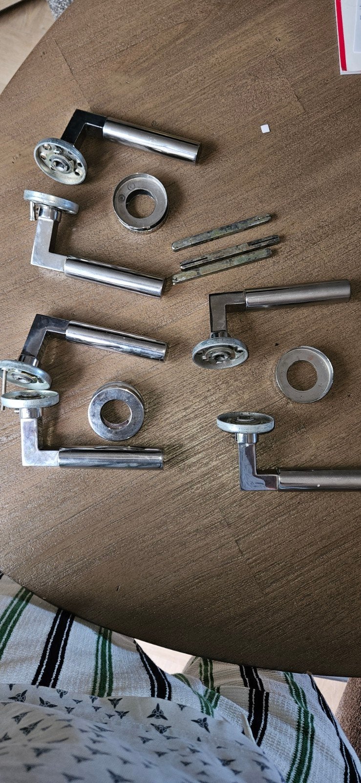 Set van 4 gebruikte deurklinken met toebehoren, Ophalen of Verzenden, Gebruikt, Rvs, Klink of Kruk