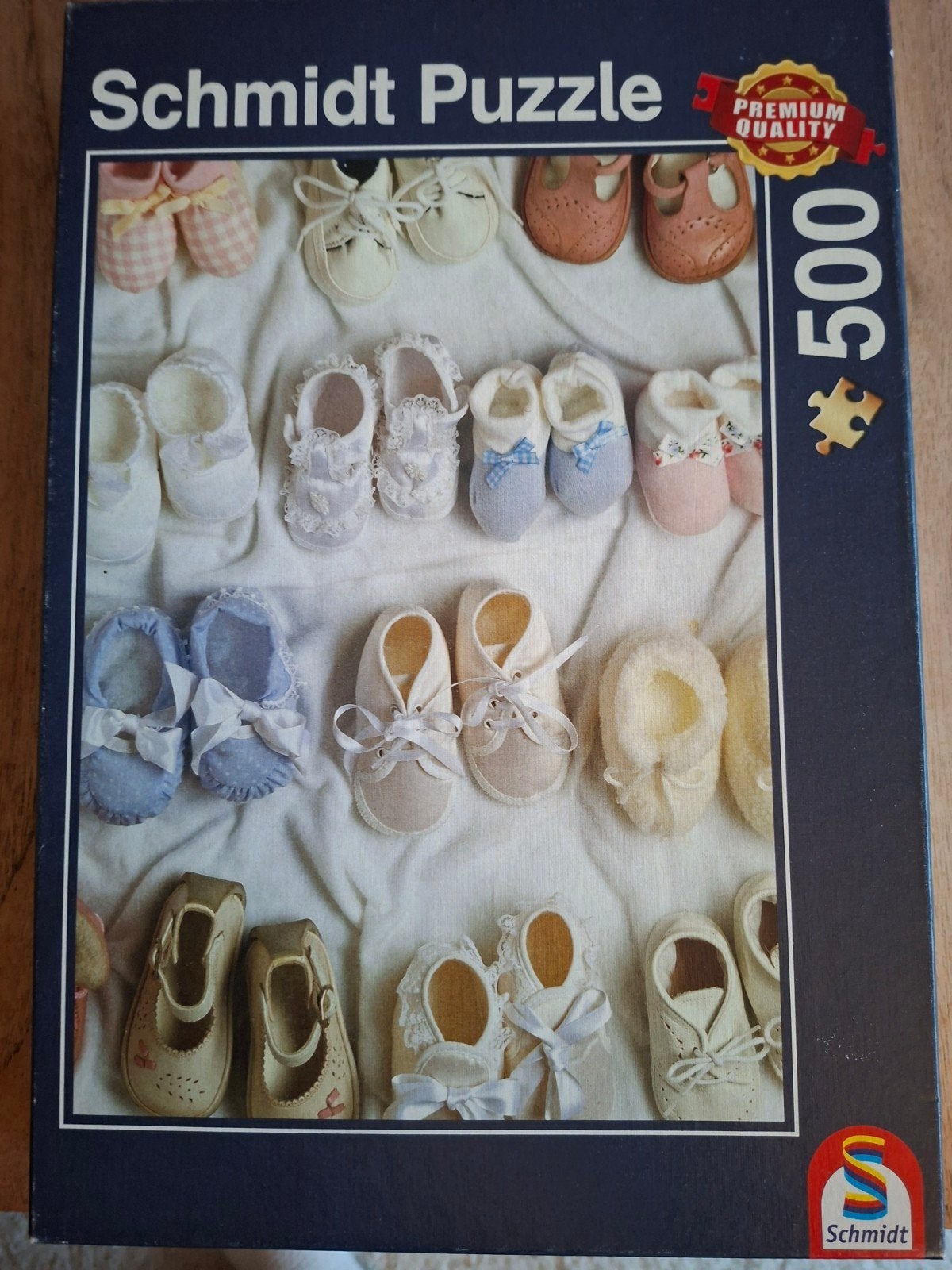 Schmidt puzzel 500 stukjes Babyschoentjes, Ophalen of Verzenden, 500 t/m 1500 stukjes, Zo goed als nieuw, Legpuzzel