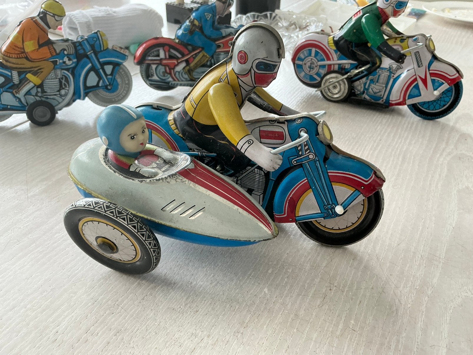 Vintage opwindbaar speelgoed, een blikken motor met zijspan., Antiek en Kunst, Antiek | Speelgoed, Ophalen of Verzenden